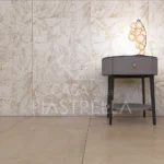 Pavimenti e rivestimenti in gres porcellanato, fiori dorati su fondo bianco