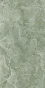 Lastra di gres porcellanato che imita l'onice giada. Lo sfondo è di un delicato colore verde salvia, con venature lattiginose e aree più chiare che richiamano l'aspetto della pietra di giada naturale