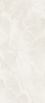 Lastra di gres porcellanato che riproduce l'onice bianco. La base è di un bianco luminoso con venature cristalline nei toni del grigio chiaro, conferendo un aspetto elegante e traslucido